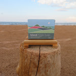Box of Island Potato Soap on a wooden block with a beach background