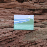 Box of Island Potato Soap on a textured stone surface